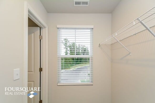 Building Photo - Modern 3-Story Townhome with First-Level Bedroom, Open Floor Plan & Community Pool – Prime RTP Lo...
