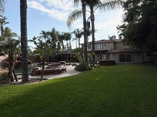 Building Photo - Gated estate with a backyard oasis