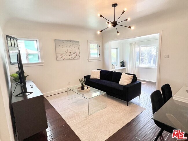 Building Photo - 7865 Willoughby Ave