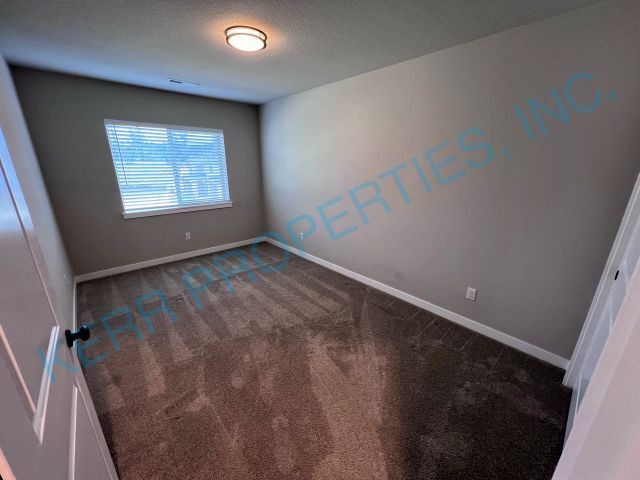 Building Photo - FREE RENT! Modern townhome living 3-Bed Retreat with 2.5 Baths in Serene Happy Valley!