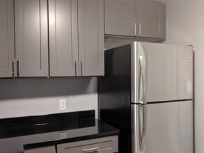 Building Photo - "Charming 2-Bedroom Gem with Granite Count...