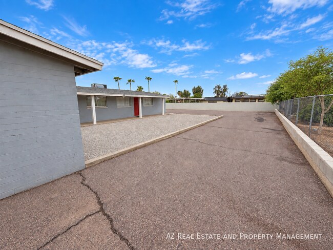 Building Photo - 10648 N 15th Ave