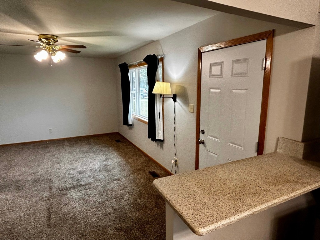 Living room & front door - 694 Tilson St N