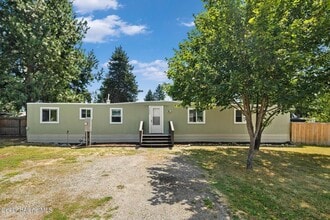 Building Photo - Manufactured Home 3 bed 1.5 bath RV Parking/Fenced Yard