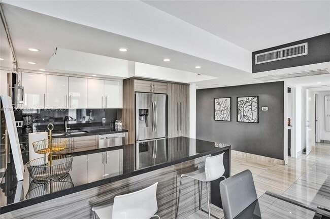 Building Photo - 19370 Collins Ave