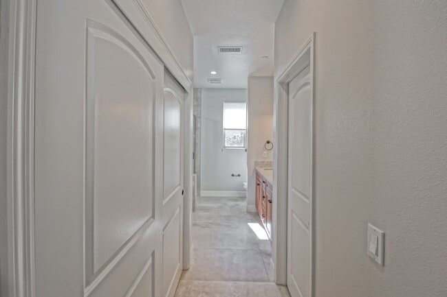 Building Photo - BUILT IN 2019: SPACIOUS & BRIGHT, DETACHED TOWNHOUSE W/ 2-CAR GARAGE & FENCED YARD IN GREAT RESID...