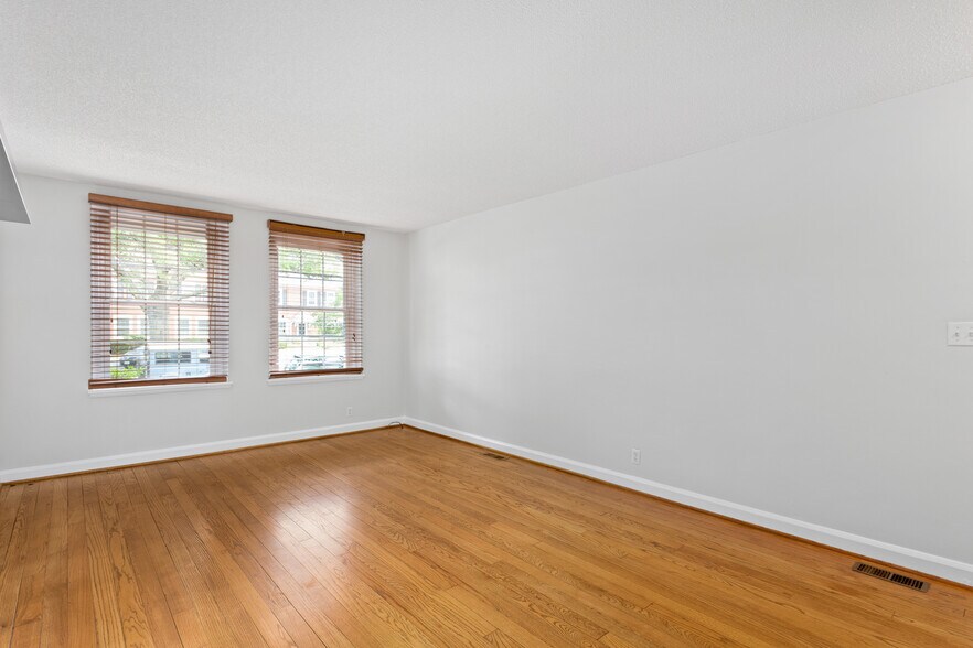 Freshly painted living room w/ natural light - 4218 35th St S