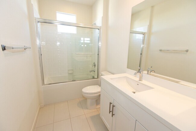 Building Photo - Highly Desired 4 Bedroom Floor Plan in Lig...