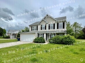 Building Photo - Large 4 bedroom 2.5 bath 2 car garage hous...