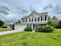Building Photo - Large 4 bedroom 2.5 bath 2 car garage hous...