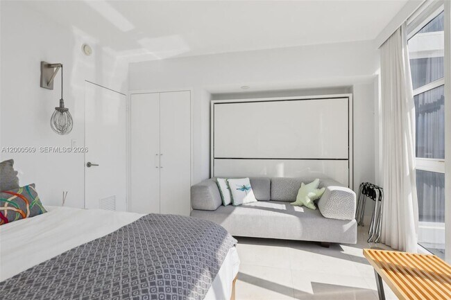 Building Photo - 10275 Collins Ave