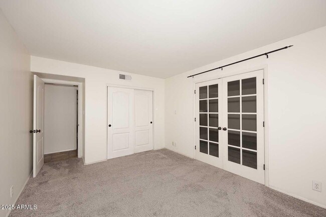 Building Photo - 7910 E Camelback Rd