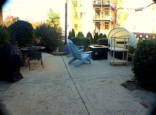 Exterior common patio rear alley - HIGHLAND HOUSE FLATS