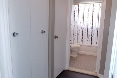 Hallway has coat and linen closets - 2809 W 13 Mile Rd