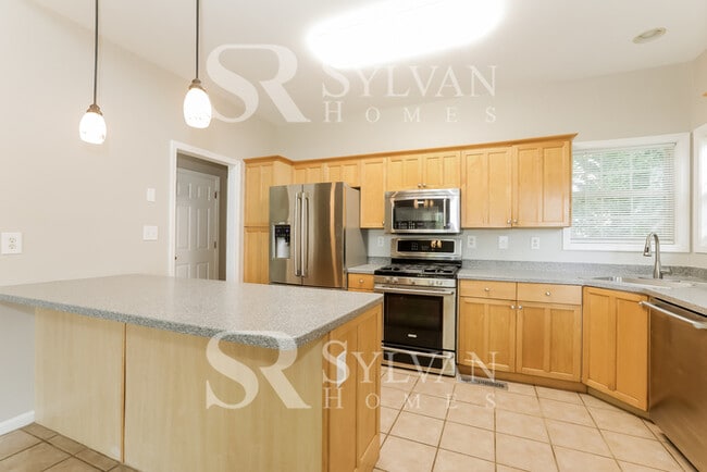 Building Photo - Turn the key. Enter. Smile. Repeat every day!