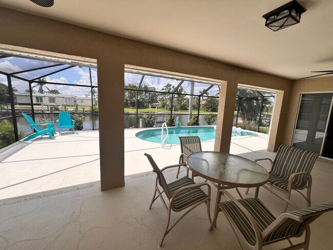 Building Photo - Waterfront Paradise in Punta Gorda Isles –...