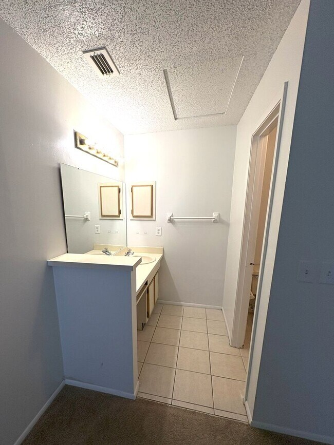 Building Photo - Charming 2-Bed, 2-Bath Home with Vaulted C...