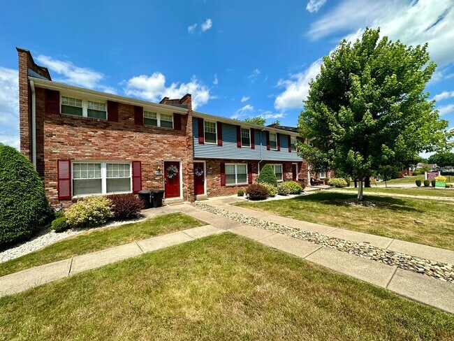 Building Photo - Stunning 2 BR Townhouse with Attached Garage! Central A/C & MORE!! CALL TODAY TO SCHEDULE A TOUR!