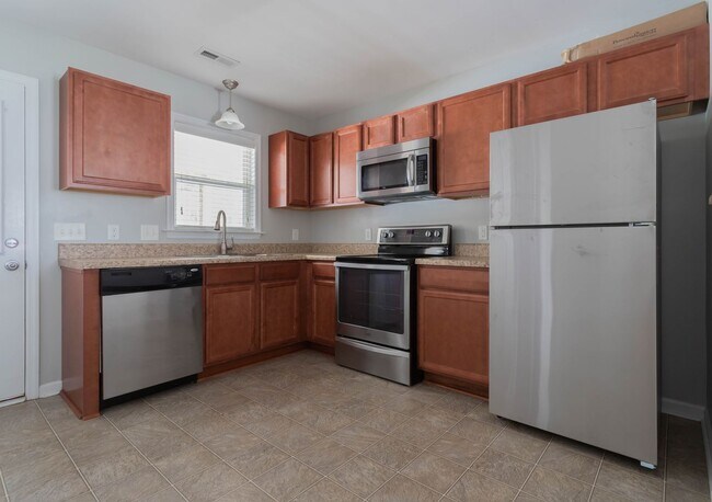 Building Photo - COMING SOON- Beautiful townhome in Carolin...