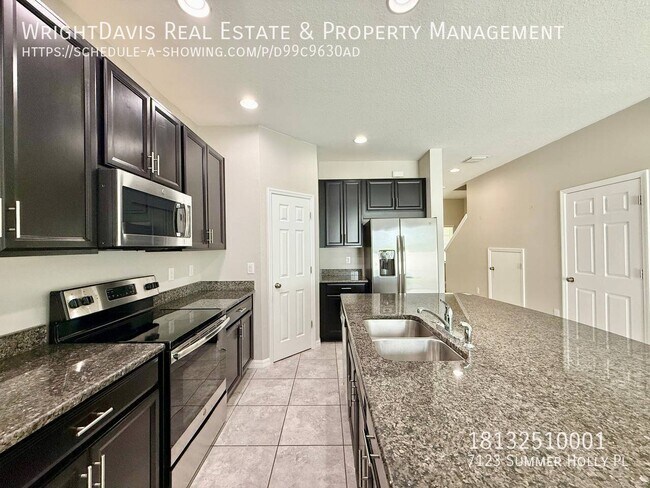 Building Photo - 7123 Summer Holly Pl