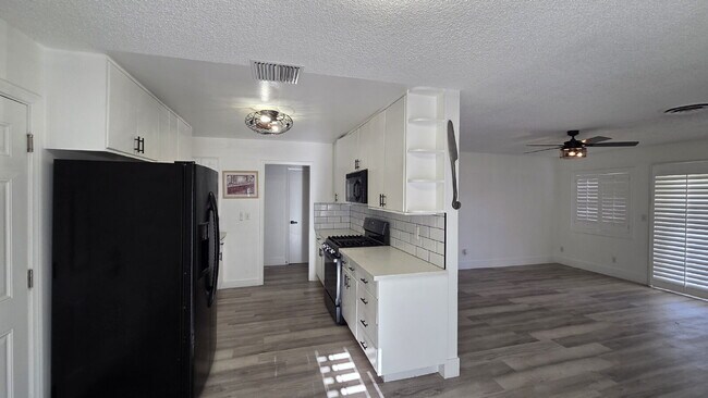Building Photo - Beautifully remodeled pool home situated on a spacious quarter-acre lot