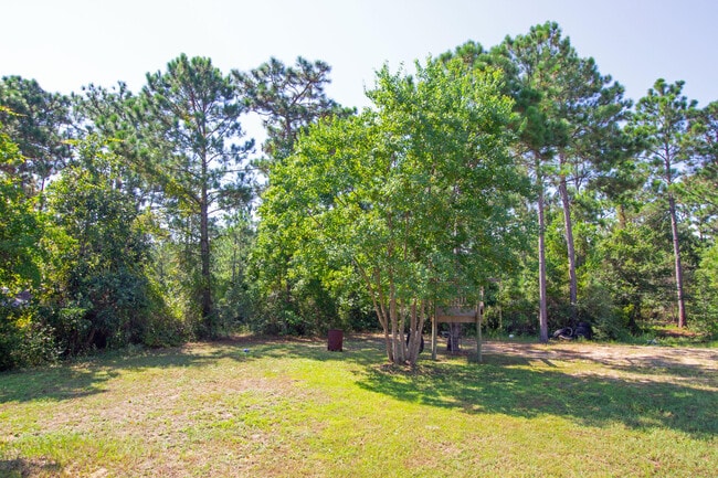 Building Photo - 9289 E River Dr