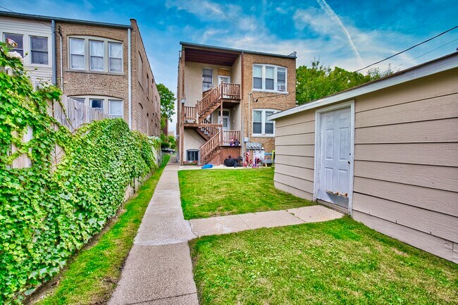 Building Photo - 6609 N Artesian Ave