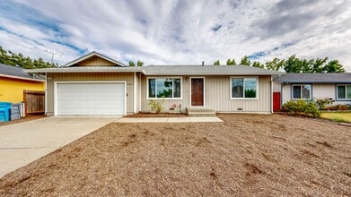 Building Photo - Bright 2 Bedroom, 1 Bathroom Single Family Home! Attached 2 Car Garage and Landscaping Included!