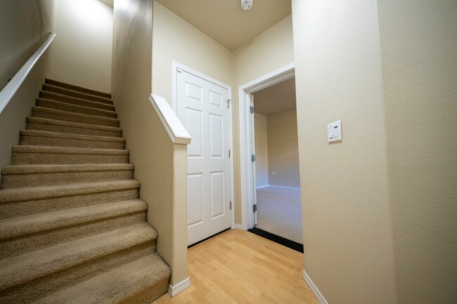 Foyer. Ground floor bedroom on right, door to garage on left. - 4828 SE Teakwood St
