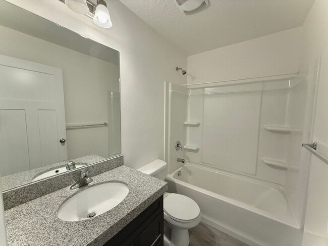 Building Photo - Townhome Available Now- Longer Lease Options