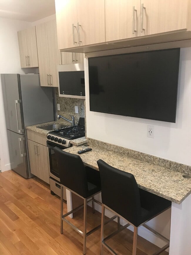 Building Photo - CHELSEA / BOSTON LUXURY STUDIO MINUTES TO ...