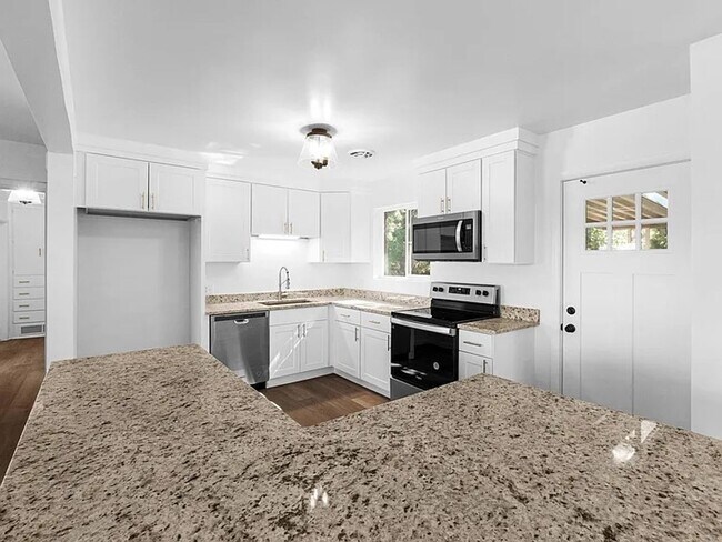 Building Photo - Renovated 4-Bedroom, 3-Bathroom Home in Millcreek
