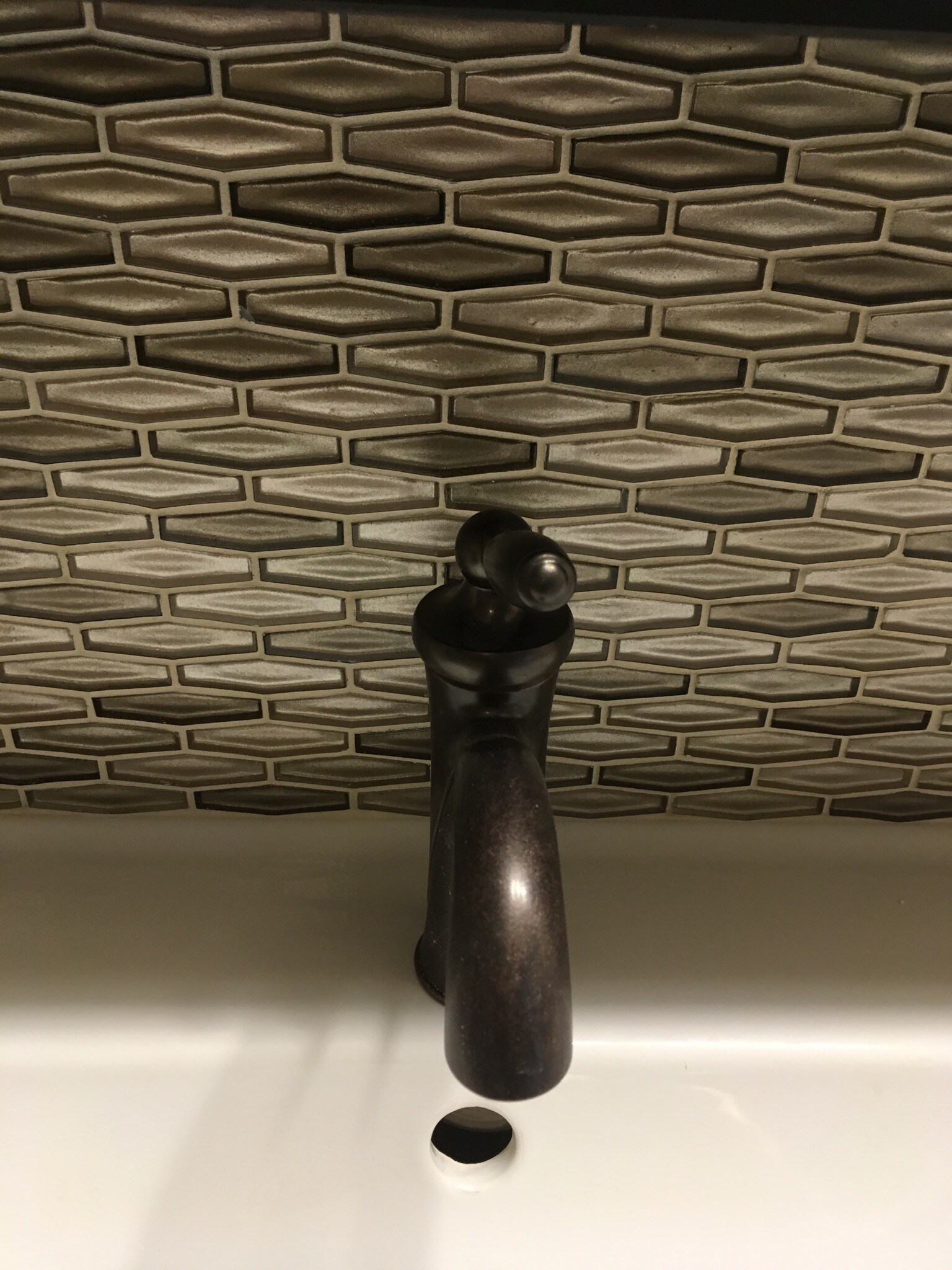 Faucet & back splash behind double sinks - 1851 Broadway St