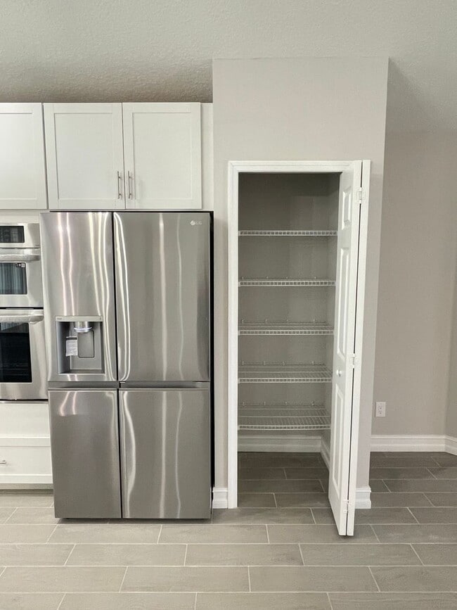 Building Photo - COMING SOON - 4/2.5/2  Home off of California Blvd.