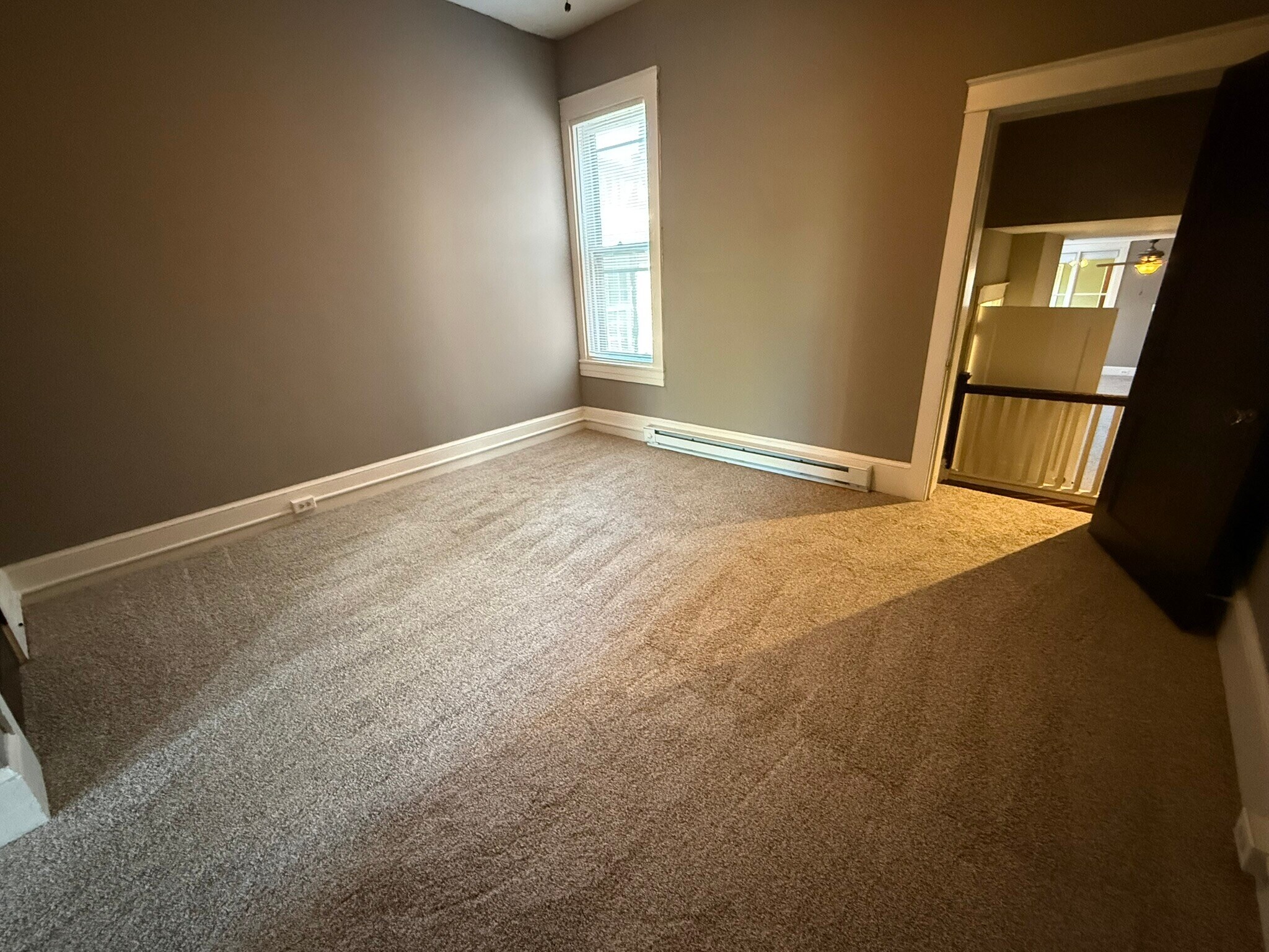Bedroom 2 facing living room - 218 E Orange St