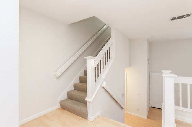 Building Photo - 3 Bed / 2.5 bath pet friendly townhome with a bonus home office/den + EV charger in garage. YouTu...