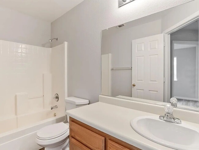 Building Photo - This is a lovely halfplex with 2 stories, 3 bedrooms, and 2.5 bathrooms in a quiet HOA neighborhood