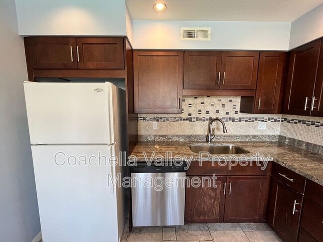 Building Photo - 1950 S Palm Canyon Dr