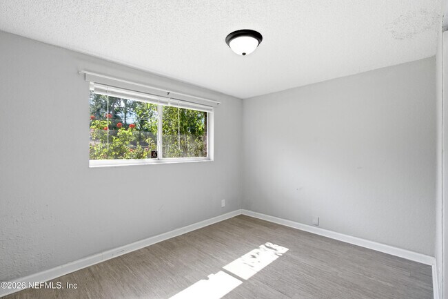 Building Photo - 7386 Dostie Dr E