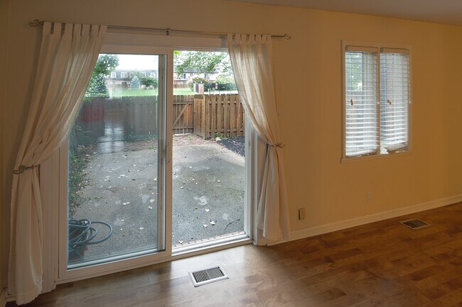 Beautiful view opens to an even more beautiful privately fenced-in patio - 8508 Canterbury Sq E