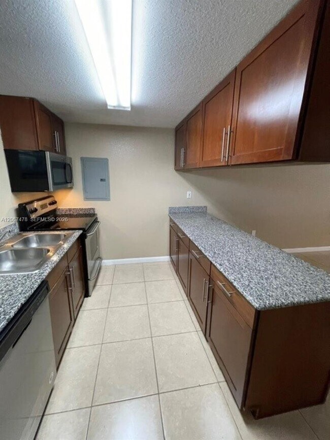 Building Photo - 8950 SW 69th Ct