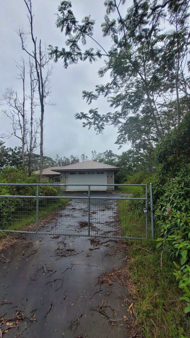 Building Photo - This 3-bedroom, 2-bath home in Orchidland Subdivision