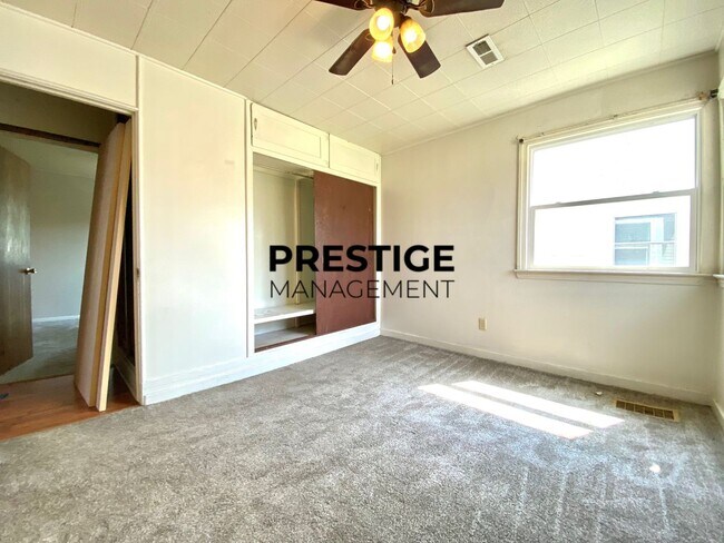 Building Photo - 1229 W 44th Pl