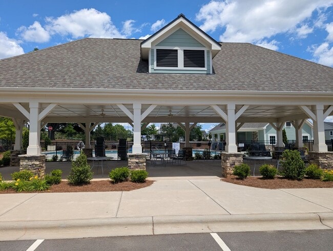 Building Photo - Elegant, Move In ready townhome located in...