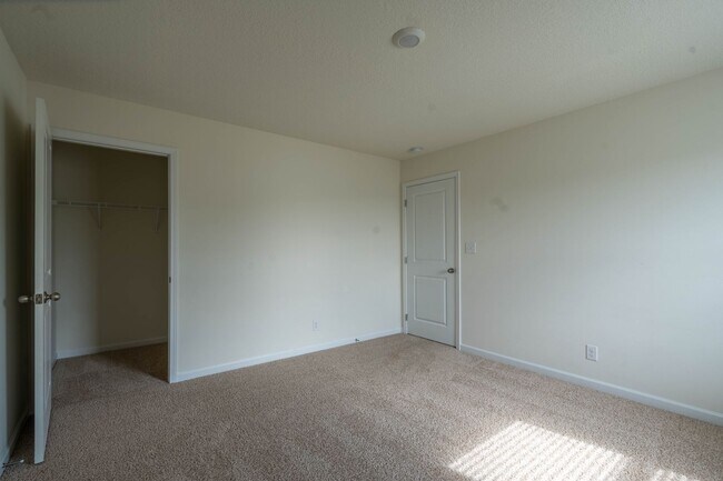 Building Photo - Newly built 3 bedroom and 2.5 bath home with garage.