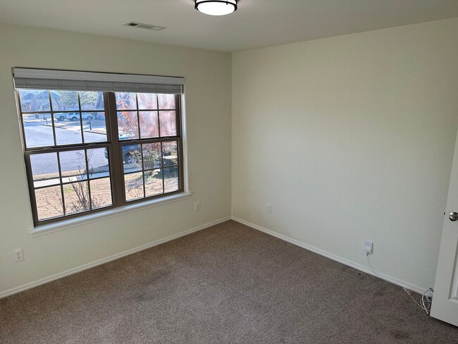 Building Photo - Available Now! Beautiful 4-Bedroom, 2-Bathroom Springdale Home w/ Fenced-In Yard and Covered Patio