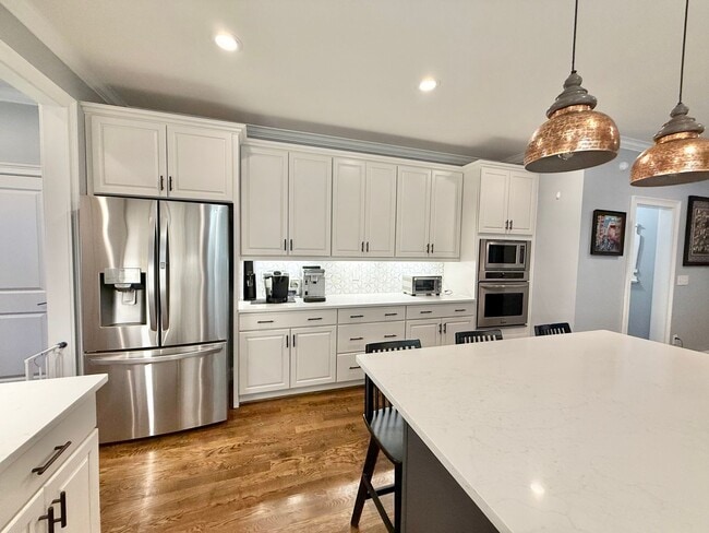 Building Photo - Luxurious 4BD, 3.5BA North Raleigh Home wi...