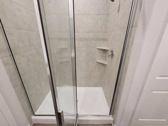 Building Photo - Welcome Home! Your never-lived-in sanctuary awaits your arrival. Have a large household? This 5-b...