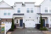 Building Photo - Like-New Townhome with a Fence & Garage!