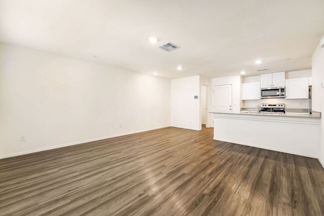Building Photo - Modern West Henderson Townhome with Sleek Upgrades & Smart Home Features!